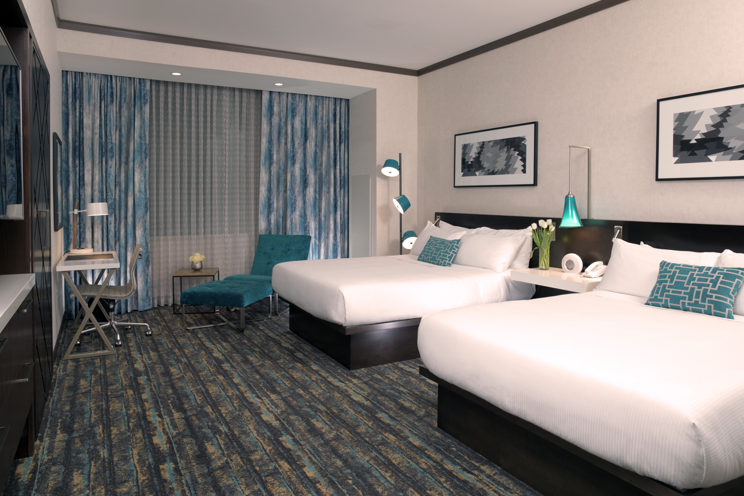 Need more than one bed?  Our Deluxe Two-Queen Room is the perfect choice.